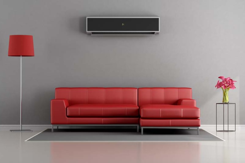 Living room with red sofa and air conditioner - 3d rendering.